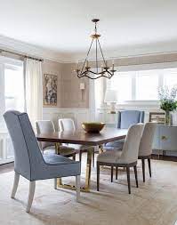 Furniture selections from martha stewart and others are waiting to fill the home. Brass Base Dining Table With Blue Wingback Chairs Transitional Dining Room