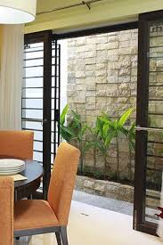 Sliding Glass Door With Grills Small House Interior Design Lanai Design Bungalow House Design
