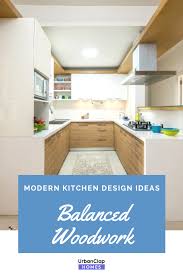 This U Shaped Modern Kitchen Design Incorporates Base Cabinetry Made Of Wood Veneers And Wall Cabine Modern Kitchen Design Kitchen Design White Modern Kitchen