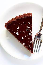 The Most Amazing Salted Dark Chocolate Tart Gimme Some Oven Recipe Chocolate Tart Chocolate Tarts Recipe Tart Recipes