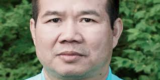 Phouthone 'Pooh' Senephimmachak, 56