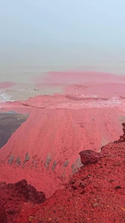 Chilling videos show eerie 'blood rain' as beach is turned bright RED in  Biblical scenes: 'The power of God'
