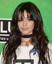 A layered shag with bangs haircut was practically made for curly hair! This Is Why The Long Layered Hair With Bangs Trend Is Still Going Strong