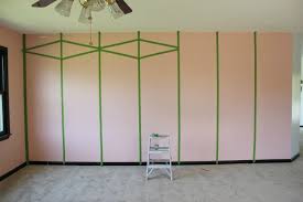 Cool frog tape wall designs. Diy Black And White Diamond Feature Wall