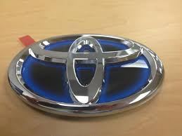 genuine toyota prius c luggage compartment door emblem oem 12 13 14 models oem toyota prius toyota prius genuine toyota prius c luggage