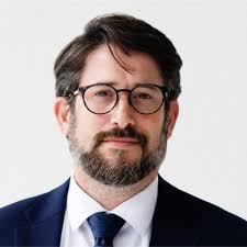 The broken system for providing waivers has been noted by aid groups for  several weeks but never spelled out in such detail in an official  government memo.