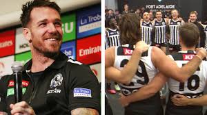 Port adelaide have courted controversy after deciding to change into their 'prison bars' guernseys to sing the team song after saturday . Afl 2021 News Collingwood Vs Port Adelaide Prison Bar Jumper Dane Swan David Koch Eddie Mcguire Reaction