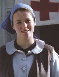 Angel of Bastogne helps wounded soldiers