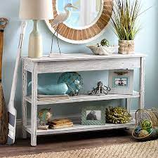 Its 36 high base is made from a blend of solid wood and veneers in a white finish and takes on a cottage charisma that's built on top. Whitewash Double Shelf Console Table Kirklands