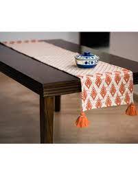 Choose from traditional lace table runners, seasonal and holiday table runners, water repellant outdoor table runners and more. Denmark Mud Small Table Runner By Ode And Cleo The Secret Label