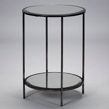 Perhaps you have a smaller space, try using this table alongside the couch or foyer to provide function but not sacrifice space. Stock Brockwell Side Table Bronze Robert Langford London