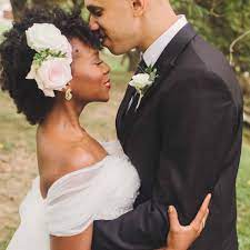 Secure with bobby pins, and then take out the elastics for a seamless braided updo. 24 Wedding Worthy Hairstyles For Curly Hair