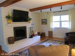 How To Mount A Tv On A Brick Fireplace On Sutton Place White Brick Fireplace Brick Fireplace Fireplace Update