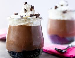 Oreos, chocolate and cream come together to make this delightful dessert!!! No Bake Milk Chocolate Cheesecakes In Jars Dessert For Two