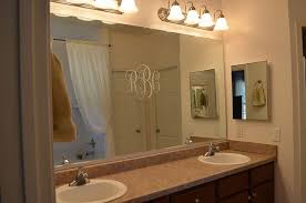 Browse a large selection of bathroom mirror designs, including fogless, lighted and framed bathroom mirrors in all shapes and finishes. Easy Diy Tutorial Adding Trim Around A Giant Mirror For Renters 11 Magnolia Lane