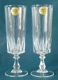 Very good, one leg slightly shorter than others from production. Pair Of Cristal D Arques Louvre Design Lead Crystal Champagne Flutes With Original Stickers Crystal Champagne Flutes Antique Collection Champagne Flutes