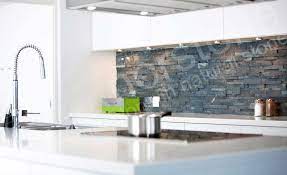 This travertine stone backsplash with natural hues adds warmth and contrasting texture to the kitchen. Natural Stacked Stone Backsplash Tiles For Kitchens And Bathrooms