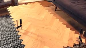 A diy tutorial on how to install your own floor to ceiling board & batten paneling. A Creative Use For Herringbone Flooring Direct Wood Flooring Blog