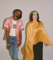 Clothing and socks by burberry; Billie Eilish Source On Twitter Billie On The Set Of Her Vanity Fair Cover Shoot
