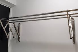 White vertical wall mount dry rack. Stainless Steel Extendable Wall Mount Cloth Laundry Hanger Drying Rack Home Furniture Others On Carousell