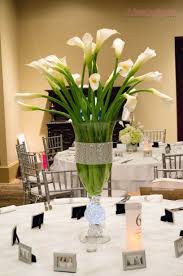 We did not find results for: Tall Calla Lily Centerpiece With Bling Wrap On Vase Calla Lily Centerpieces Calla Lily Floral Wedding