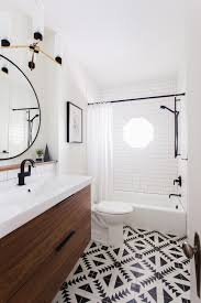 Black And White Patterned Floor Tiles Bathroom Graphic Geometric Patterned Floor Tile Serves As The Focal Point And Color Palette Inspiration Fo Bathroom Inspiration Small Bathroom Design Bathrooms Remodel