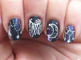 Sun And Moon Nail Art Inspired By A Drawing Tattoo I Saw Over A Super Sick Iridescent Polish That Is Blue Green And Purp Nail Art Moon Nails Swarovski Nails 3d snowman acrylic nail art.