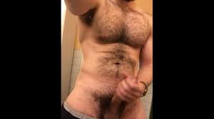 Muscled Hung Hairy Stud Jerking in Public Restroom 