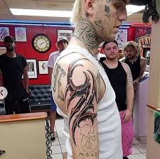 Just below his lisa sympson's tattoo, lil peep had a tattoo, which read hellboy in a funky algerian script font. Hellboy Tattoo Lil Peep