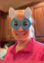 Person holding kitty and pipe