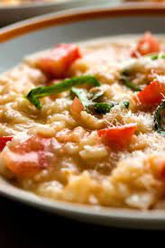 Nyt Cooking This Is A Luxurious Summer Risotto With Tomatoes Both Cooked Along With The Rice And Added Uncooked To The Fi Risotto Recipes Nyt Cooking Risotto