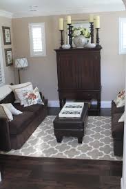 Pin By Paula On Floors Living Room Wood Floor Brown Furniture Living Room Brown Living Room