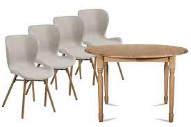 Une table ronde suscite spontanément de l'empathie et invite à s'asseoir en toute convivialité. Ensemble Table Ronde Chaises Matilda Hellin