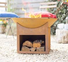 Is it safe to use a rusty fire pit. Rusty Shabby Chic Cast Iron Fire Pit With Log Store Savvysurf Co Uk