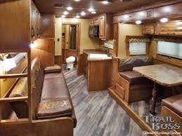Warm And Gold Tones In This Bloomer 5 Horse Trailer With A Living Quarters Done By Trail Boss Conversions Luxury Rv Luxury Living Horse Trailer