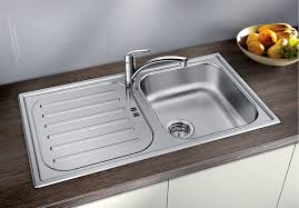The unit lets water drain or will act as a stopper and let you fill the sink if desired and it doesn't leak. Flex Pro 45 S Stainless Steel Natural Finish W O Drain Remote Control Blanco
