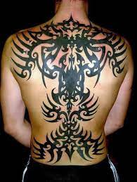 The abs and wings make this feel like this tattoo is a photo. 60 Tribal Back Tattoos For Men Bold Masculine Designs
