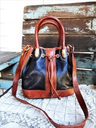 Black And Brown Leather Purse Vintage Marino Orlandi Italian Leather Purse Bucket Bag Handbag Crossbody Drawstring Two Tone Black Brown Leather Italy Brass Hardware In 2020 Leather Purses Bucket Bag Cross Body Handbags