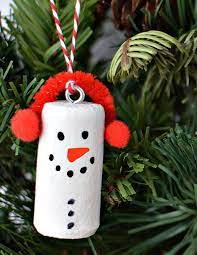 Mix up the colors and styles to make a colorful christmas tree. Diy Wine Cork Snowman Christmas Tree Ornaments Cork Crafts Christmas Christmas Ornament Crafts Christmas Crafts