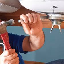 Preparing to replace a drain How To Replace A Kitchen Sink Basket Strainer Diy Family Handyman