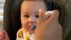 Watch newest Gerber baby Zane try solid foods for the first time!