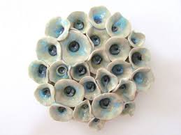 A lot of interesting patterns are available nowadays so you can get creative and create that unique wall you've been. Round Wall Art Tiles Ceramic Sculptures Tiles Beach Style Wall Hanging Ceramic Tile Wall Decor Ceramic Sculpture Round Wall Art Tile Art