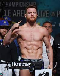 Is canelo alvarez the most unstoppable boxer today?! Boxer Canelo Alvarez Poses On The Scale During His Official Weigh In Canelo Alvarez Saul Canelo Alvarez Boxer