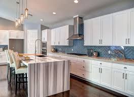 Glossy oak wood floors in kitchen and recessed lighting. Subway Tile 16 New Reasons To Love The Look Bob Vila