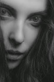 A close up of a woman's face photo