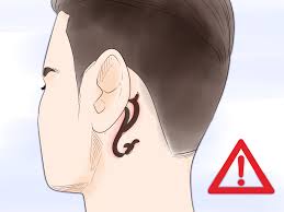 I'm planning on getting my first tattoo in a few months and i'm going to get it behind my left ear. How To Get A Behind The Ear Tattoo With Pictures Wikihow