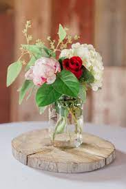 Wedding Centerpiece With Hydrangea Peony Rose And Seeded Eucalyptus Wedding Centerpieces Centerpieces Peonies