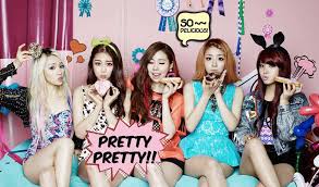 Portrait of pretty young blonde lady with long hair keeping head on raised hands, making faces, looking aside joyfully with closed eye and showinng tongue. Pretty Pretty Ladies Code Is Back Seoulbeats