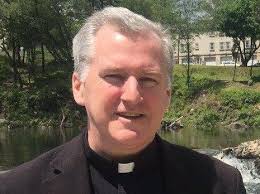 Archdiocese seeks to curb divisive priest's Twitter 'trolling'
