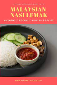 Nasi Lemak The National And Traditional Dish Of Malaysia Is Cooked In Coconut Milk With Some Pand Asian Recipes Recipes Spicy Recipes